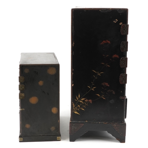 1414 - Two Japanese black lacquered table top chests hand painted and gilded with birds amongst flowers, ea... 