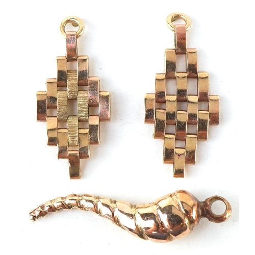 3225 - Unmarked gold jewellery comprising a Cornicello charm and a pair of drop earrings, the largest 2.0cm... 