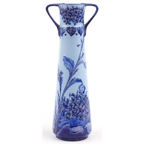 259 - William Moorcroft for james MacIntyre & Co., an Art Nouveau Florian Ware twin handled vase hand pain... 