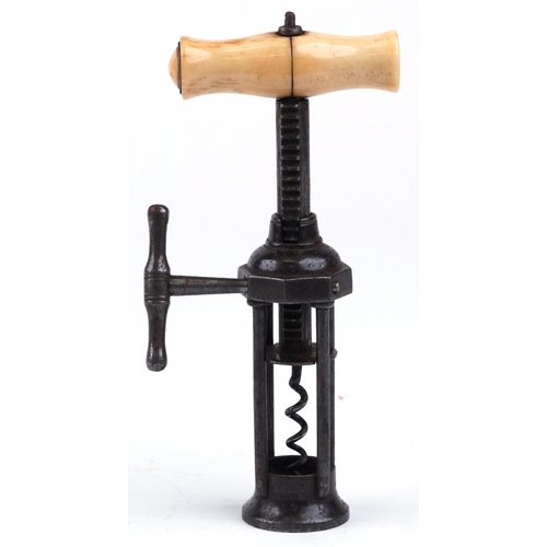 118 - An antique steel rack and pinion corkscrew 'Kings Corkscrew' with bone handle, 17cm in length.