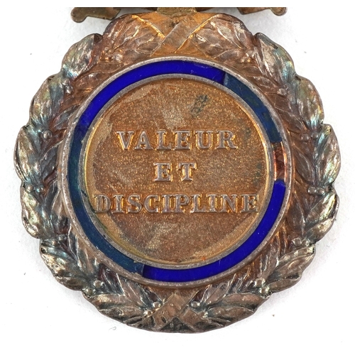 2647 - A military interest Red Cross Voluntary Service medal awarded to Miss Winifred. A. Low together with... 