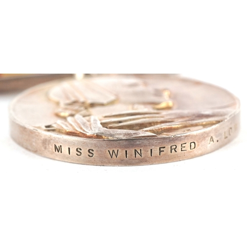 2647 - A military interest Red Cross Voluntary Service medal awarded to Miss Winifred. A. Low together with... 