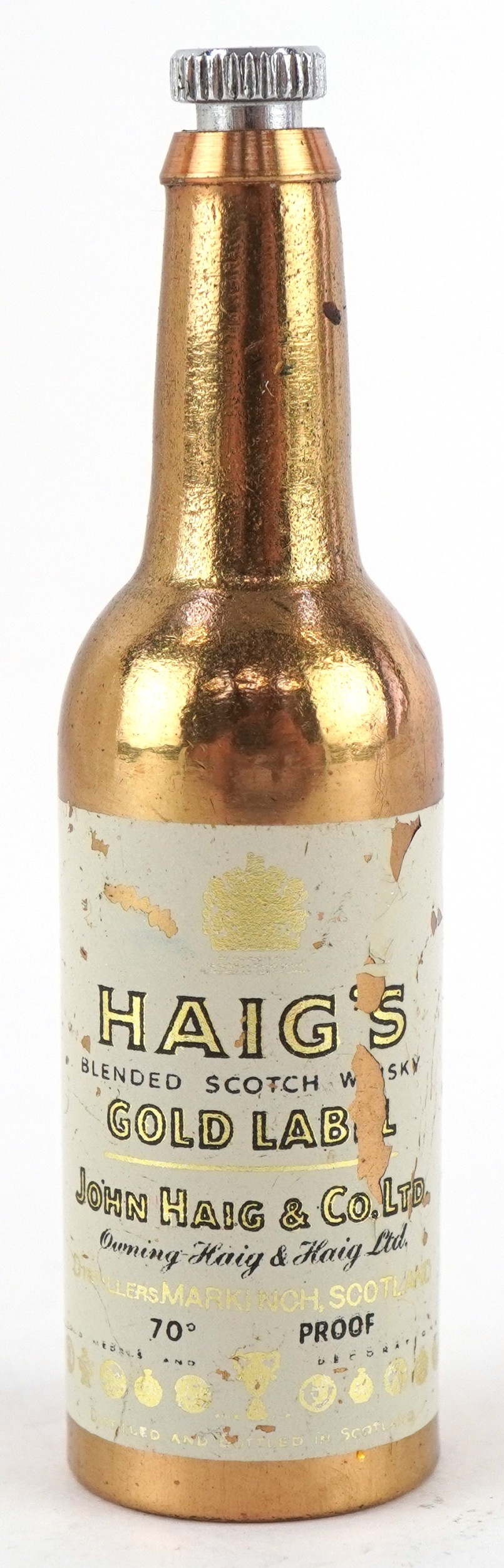 A miniature Haig's Gold Label whisky bottle opener, 7cm high.