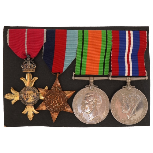 2639 - A British military World War II medal trio and a MBE medal with dress medals.