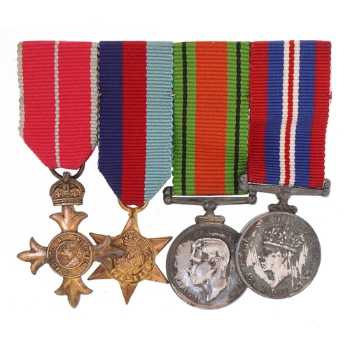 2639 - A British military World War II medal trio and a MBE medal with dress medals.