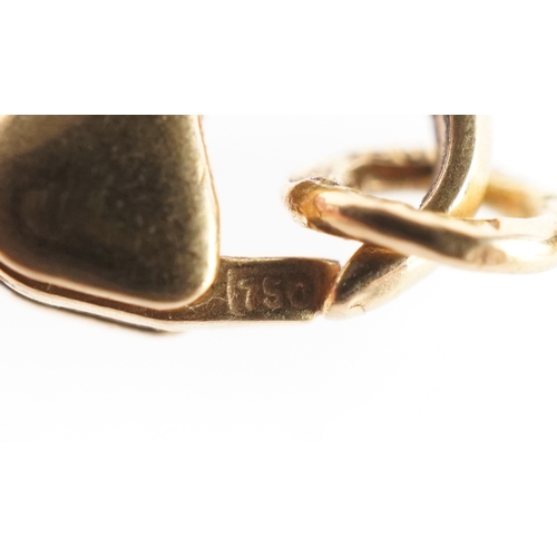 3016 - A 9ct gold engine turned cross pendant on an 18ct gold necklace, 2.9cm high and 40cm in length, the ... 