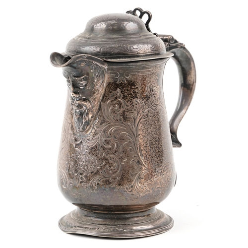 Thomas Wallis I, a George III silver tankard  having a hinged lid and blank cartouche, the later added spout in the form of a bearded gentleman, the tankard London 1766, the spout hallmarked Robert Harper London 1869, 20cm high, 763.0g.