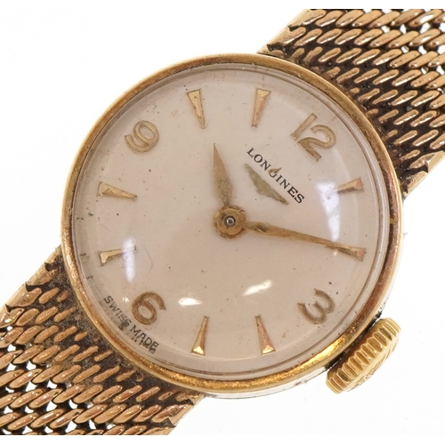 Longines, a ladies 9ct gold cased manual wind wristwatch on a 9ct gold strap, with box, the dial 17mm in diameter, total 20.8g.