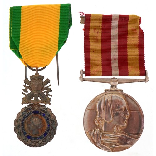 2647 - A military interest Red Cross Voluntary Service medal awarded to Miss Winifred. A. Low together with... 