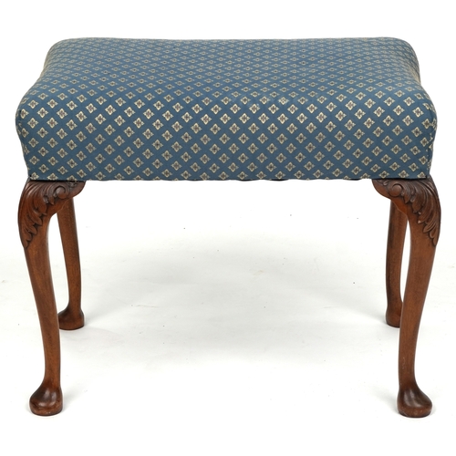 An early 20th century Queen Anne style mahogany stool, the overstuffed ...