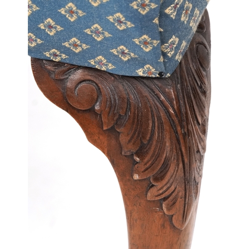 An early 20th century Queen Anne style mahogany stool, the overstuffed ...