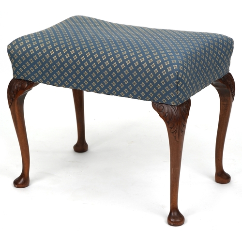 An early 20th century Queen Anne style mahogany stool, the overstuffed ...
