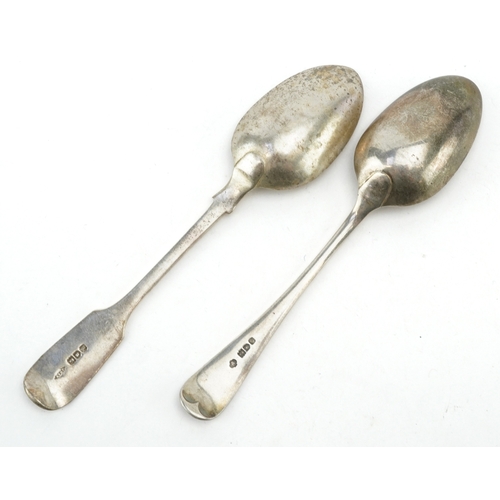 3557 - Two George V silver spoons, the largest 18cm in length, total 100.0g.