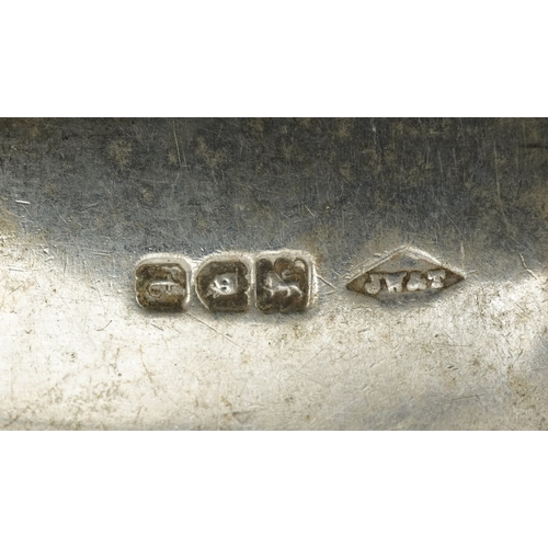 3557 - Two George V silver spoons, the largest 18cm in length, total 100.0g.