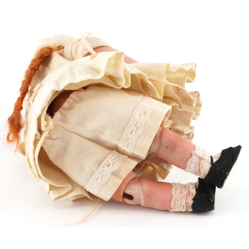 An French FFBJ bisque headed doll with glass eyes and jointed limbs ...