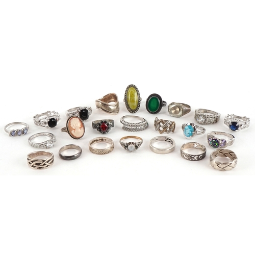 Twenty two vintage and later silver and white metal rings, some set ...