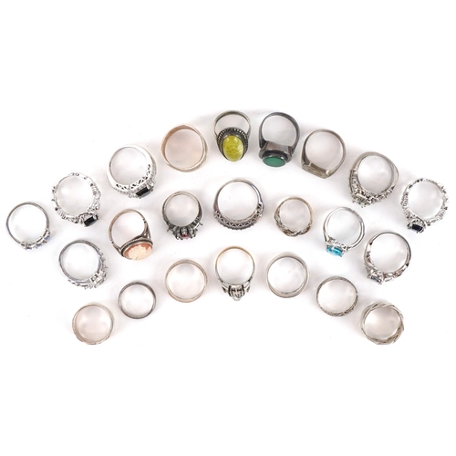 Twenty two vintage and later silver and white metal rings, some set ...