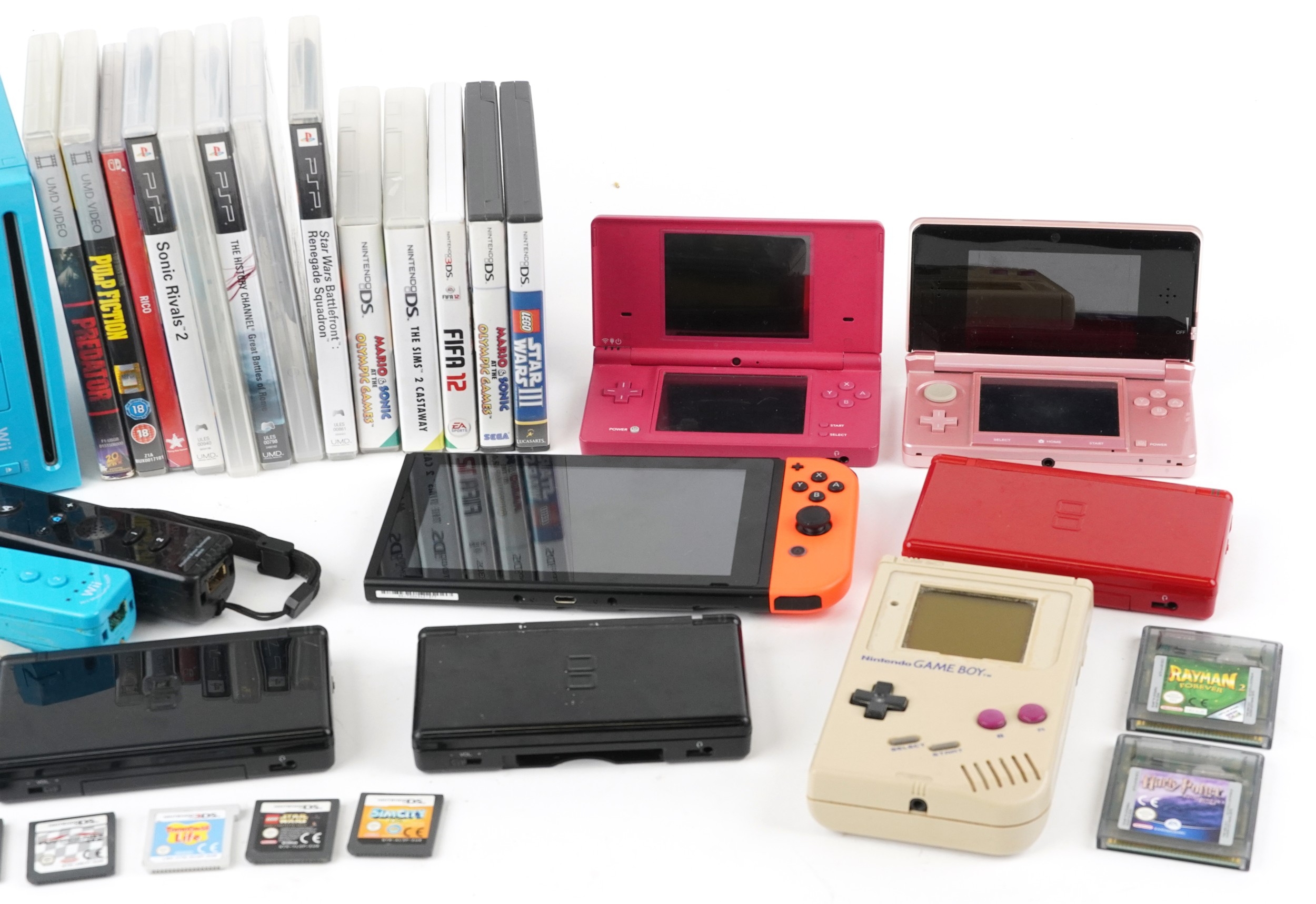Vintage and later handheld games consoles with games and accessories ...