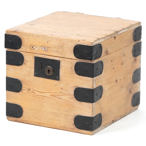 A 20th century pine and metal bound box, 29cm H x 31cm W x 32cm D.