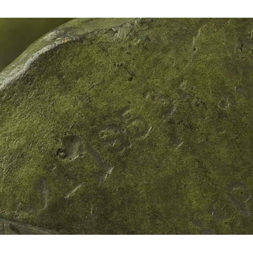 2683 - A patinated bronze death mask of Josef Stalin, 34cm high.