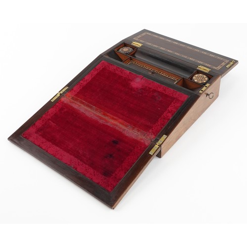 103 - A Victorian Tunbridge Ware writing slope decorated with a bird and flowers, the hinged lid revealing... 