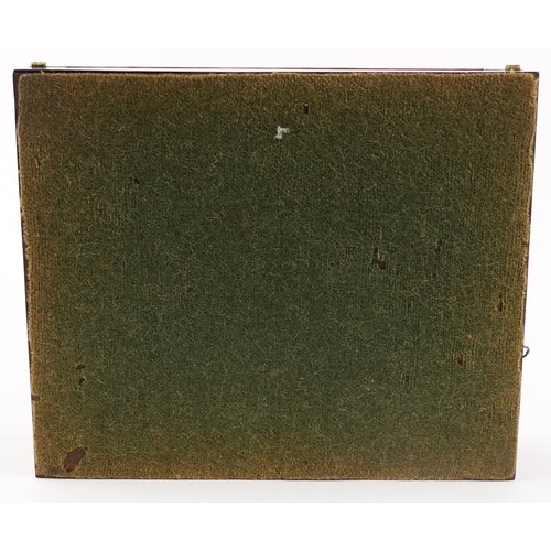 103 - A Victorian Tunbridge Ware writing slope decorated with a bird and flowers, the hinged lid revealing... 