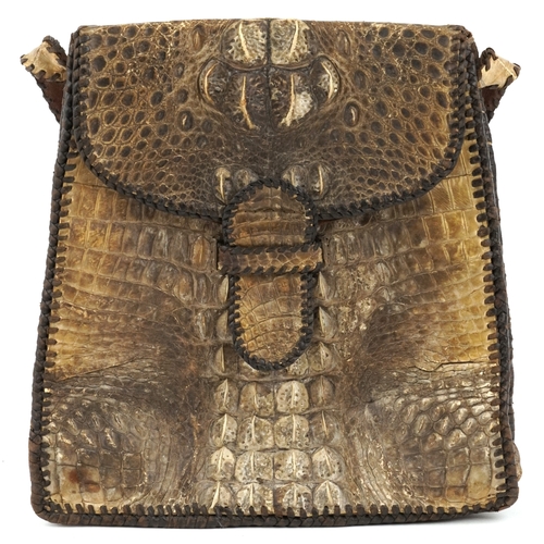 1017 - A taxidermy interest hornback crocodile leather bag with two compartments, 26cm high x 26cm wide.