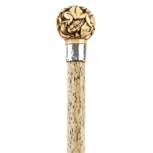 418 - A Victorian whalebone walking stick with silver collar, Birmingham 1894, the handle carved with frog... 