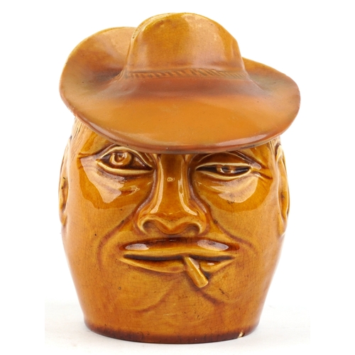 329 - An early 20th century Salopian tobacco jar and cover in the form of a gentleman smoking, modelled by... 