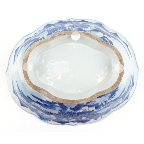 1450 - A Chinese blue and white porcelain footed dish hand painted with figures in a rural landscape, 8.5cm... 