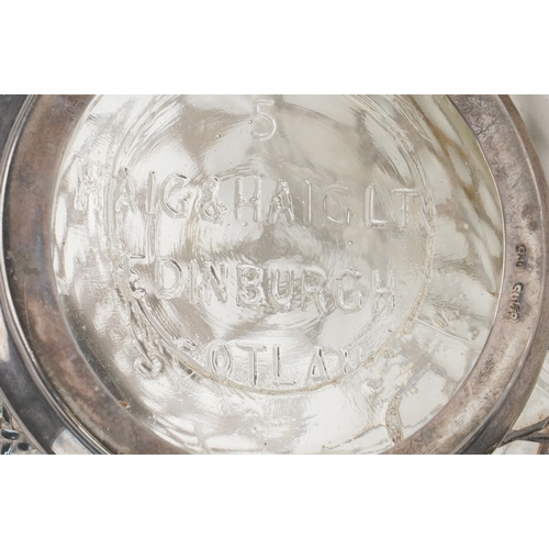 146 - Two glass whisky decanters with 950 grade silver overlay comprising one inscribed Haig & Haig, the o... 
