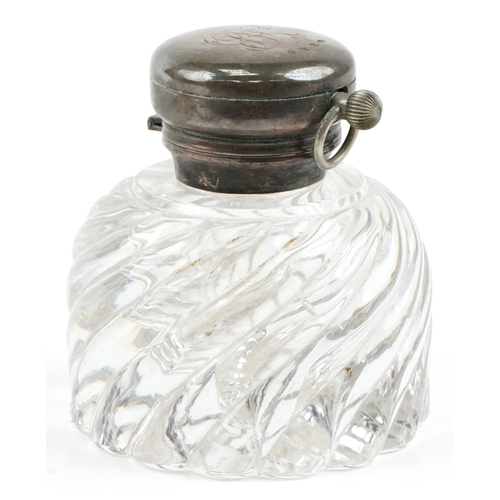  Hamilton & Inches, a Victorian cut crystal and silver mounted desk inkwell, the hinged lid revealing... 