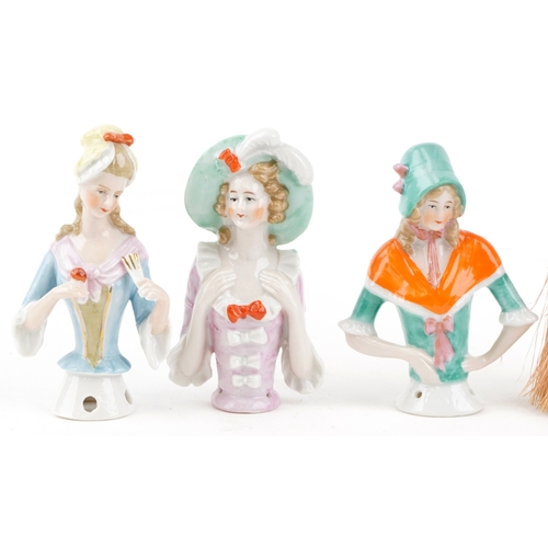 1791 - A collection of early 20th century continental porcelain half doll pincushions, mostly modelled as 1... 