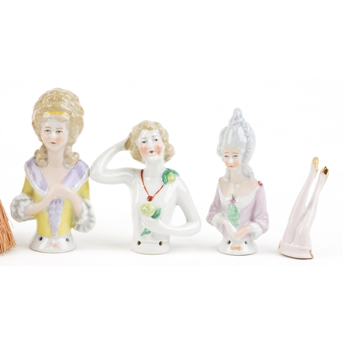 1791 - A collection of early 20th century continental porcelain half doll pincushions, mostly modelled as 1... 