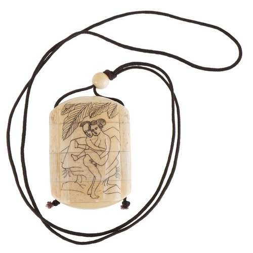 155 - A Japanese bone four section inro carved with an erotic couple and a bird, 6cm high.