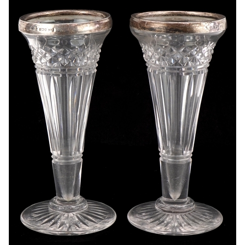 3674 - Army & Navy, a pair of Edwardian cut glass spill vases with silver mounts, London 1911, 15cm high.