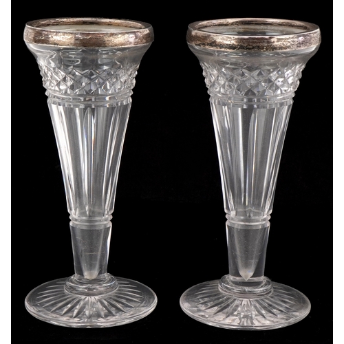 3674 - Army & Navy, a pair of Edwardian cut glass spill vases with silver mounts, London 1911, 15cm high.