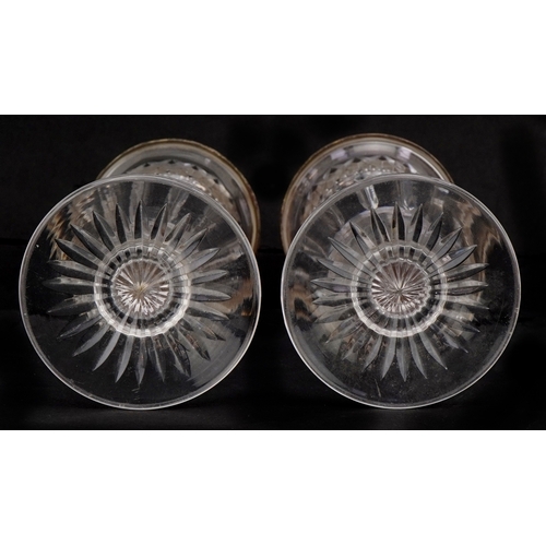 3674 - Army & Navy, a pair of Edwardian cut glass spill vases with silver mounts, London 1911, 15cm high.