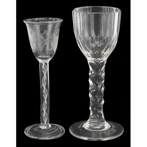 42 - An 18th century wine glass with air twist stem and etched floral decoration together with a facetted... 