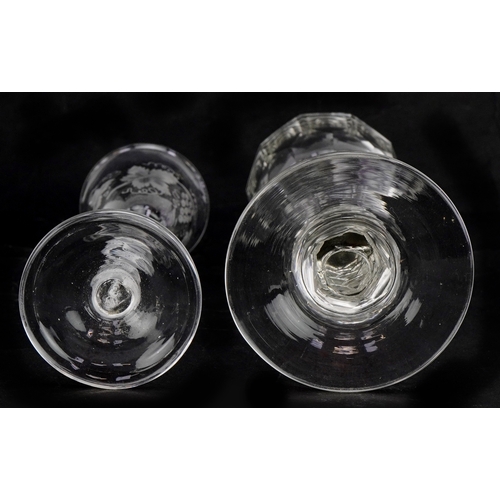 42 - An 18th century wine glass with air twist stem and etched floral decoration together with a facetted... 