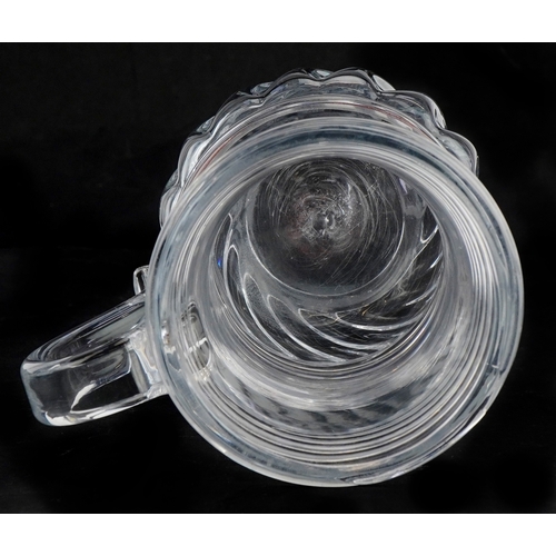 45 - A Georgian hand blown glass tankard, 14.5cm high.