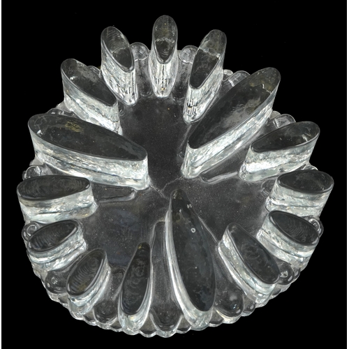 443 - A 20th century glass trivet, 19cm in diameter.