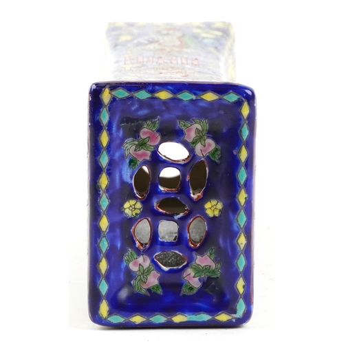 139 - A Chinese porcelain opium pillow finely hand painted with dragons and scrolling foliage, character m... 