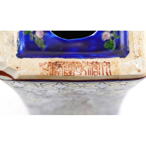 139 - A Chinese porcelain opium pillow finely hand painted with dragons and scrolling foliage, character m... 