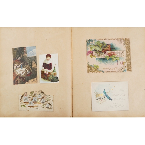 1287 - A collection of Edwardian greetings cards housed in a leather bound album together with an early 20t... 