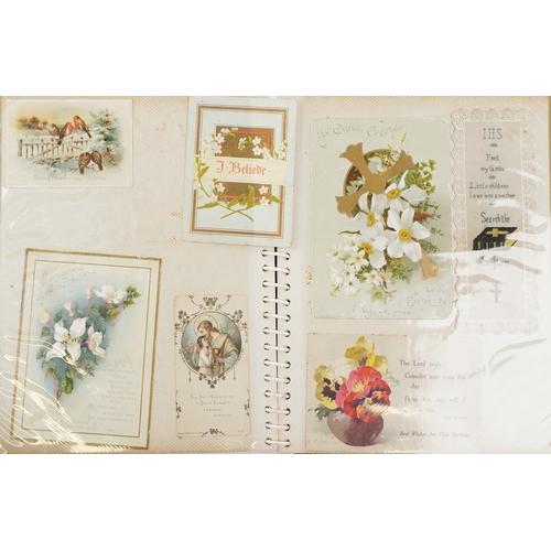 1287 - A collection of Edwardian greetings cards housed in a leather bound album together with an early 20t... 