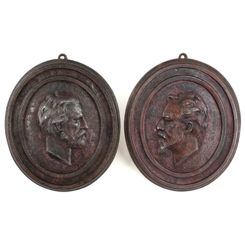 528 - Joseph Kudlicz, a pair of late 19th/early 20th century cast iron plaques of The Founders of Soilol, ... 