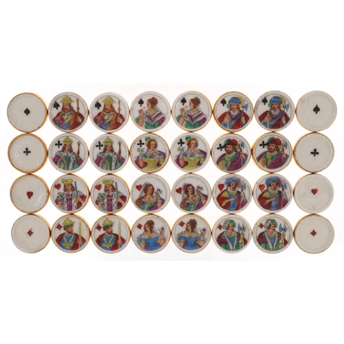  Thirty two 19th century porcelain whist markers, each hand painted and transfer printed with suits, ... 