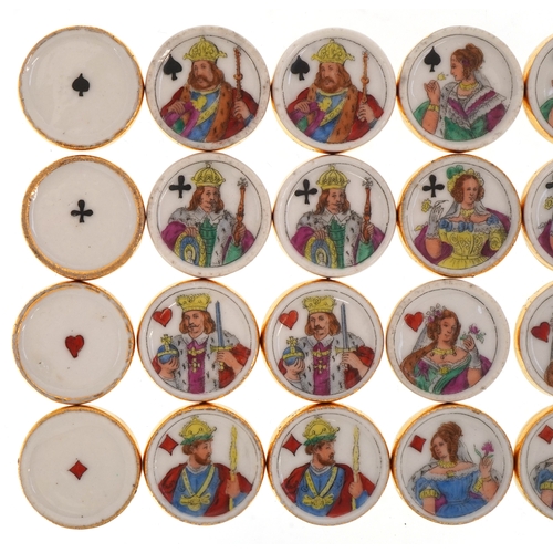  Thirty two 19th century porcelain whist markers, each hand painted and transfer printed with suits, ... 