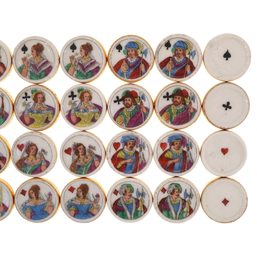  Thirty two 19th century porcelain whist markers, each hand painted and transfer printed with suits, ... 